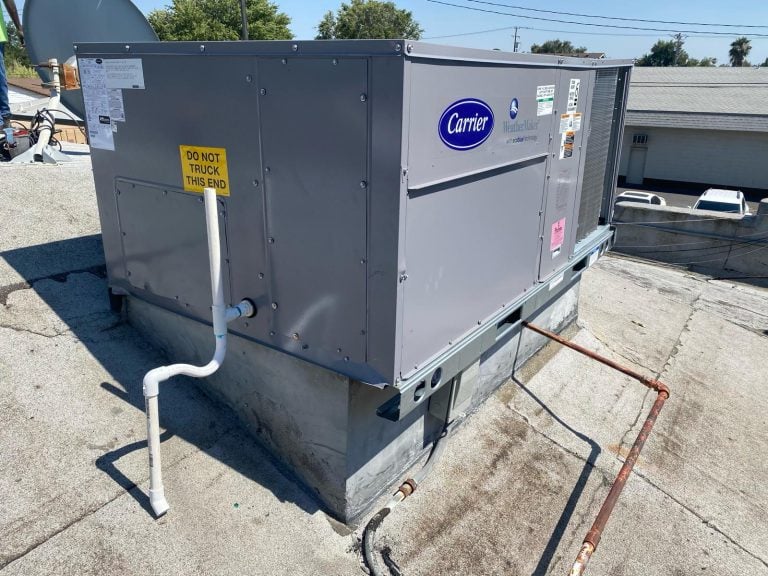 Carrier rooftop package unit installed on a flat commercial roof.