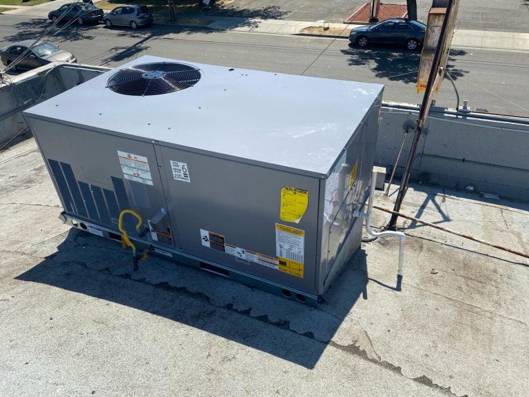 Commercial rooftop package HVAC unit installed on a flat commercial roof.