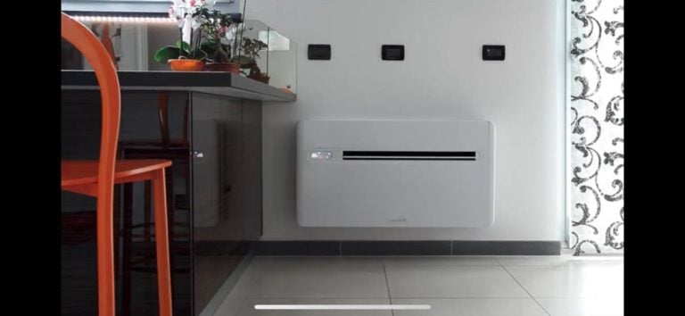 Wall mounted air conditioning unit installed in a modern kitchen.