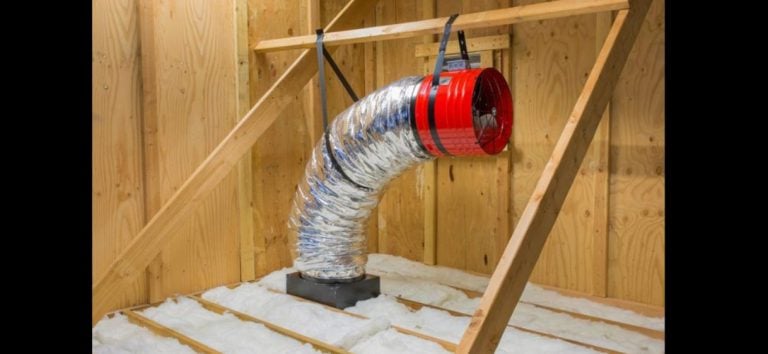 Whole house fan installed in an attic for home ventilation.